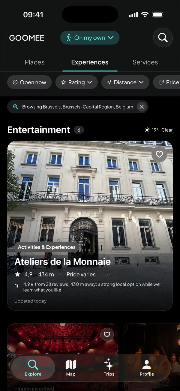 The GOOMEE app's Experiences tab, suggesting entertainment in Brussels